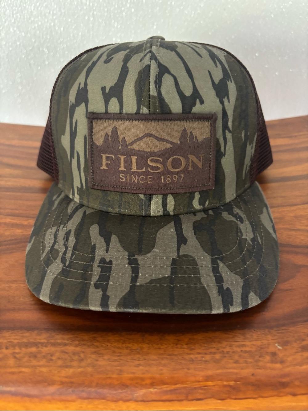 Filson X Mossy Oak bottom land Camo Trucker Hat with Brass Buckle